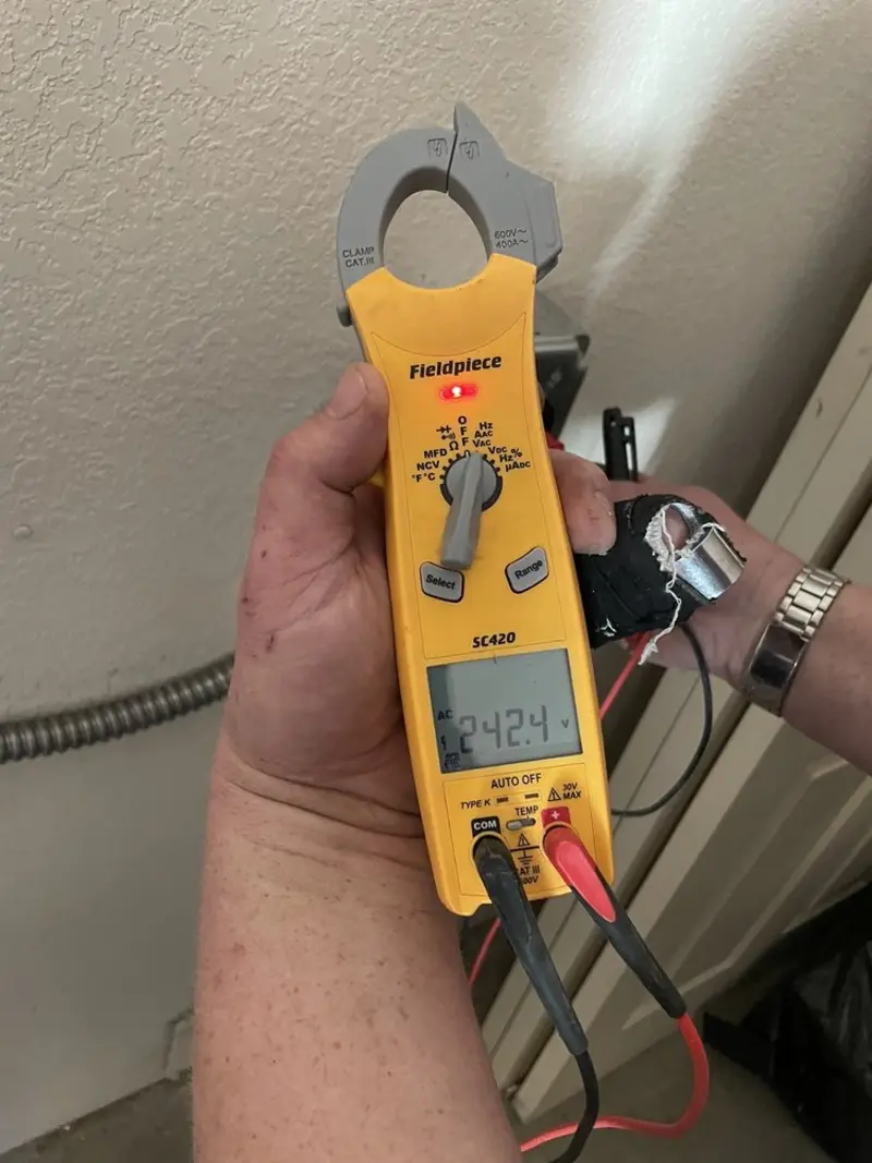 Voltage testing with clamp meter during Generator Installation in Robinwood
